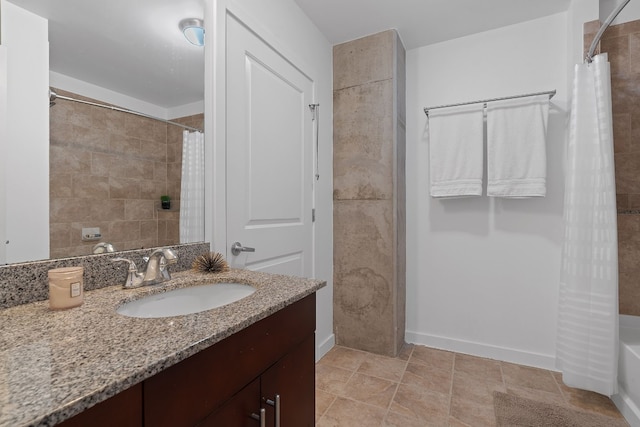 bathroom featuring vanity and shower / bath combo with shower curtain