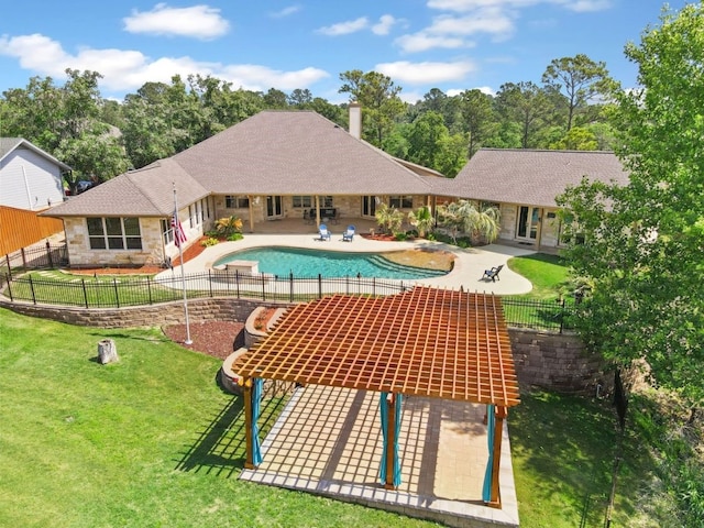view of pool featuring a lawn, a fenced in pool, a fenced backyard, and a patio area