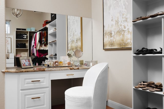 walk in closet with indoor bar