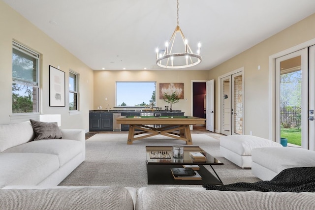 111 Kolekole Ln, Bastrop, TX 78602 - living area featuring a chandelier, healthy amount of natural light, and pool table