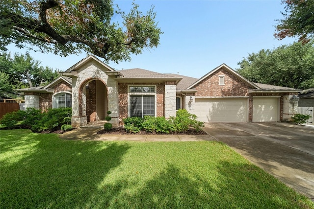 view of front facade featuring a front lawn and a garage