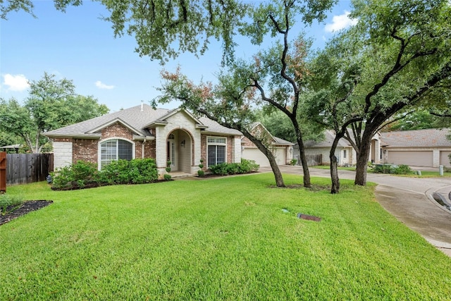 ranch-style house featuring a front lawn