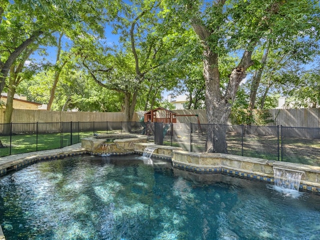 view of swimming pool featuring pool water feature