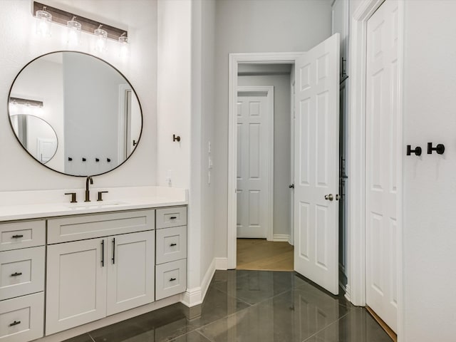 bathroom featuring vanity and tile patterned flooring