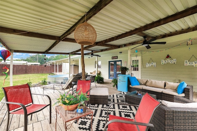 view of patio / terrace with an outdoor hangout area, a deck, and ceiling fan