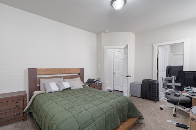 bedroom with light carpet