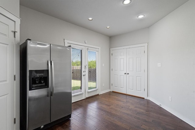 16304 Travesia Way, Austin, TX 78728 - kitchen with stainless steel fridge with ice dispenser, dark wood-style floors, recessed lighting, and french doors
