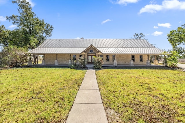 view of front of property with a front lawn