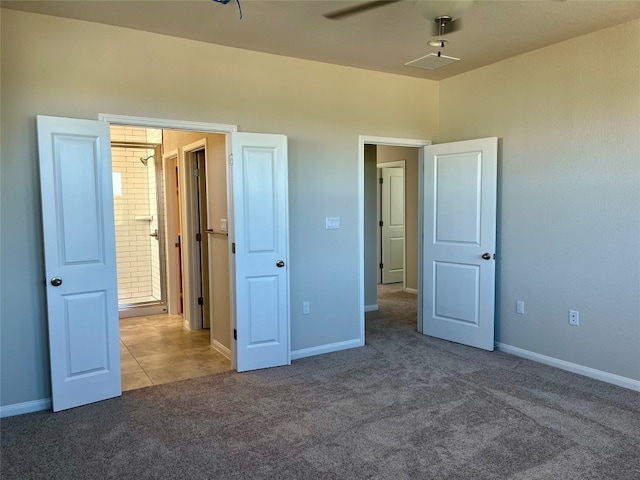 unfurnished bedroom with carpet flooring and ceiling fan