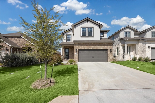 view of front facade with a garage and a front lawn