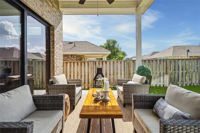 1325 Kneehigh Dr, Georgetown, TX 78633 - fenced backyard with a ceiling fan and an outdoor living space