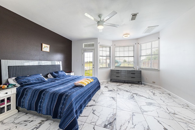 bedroom featuring ceiling fan