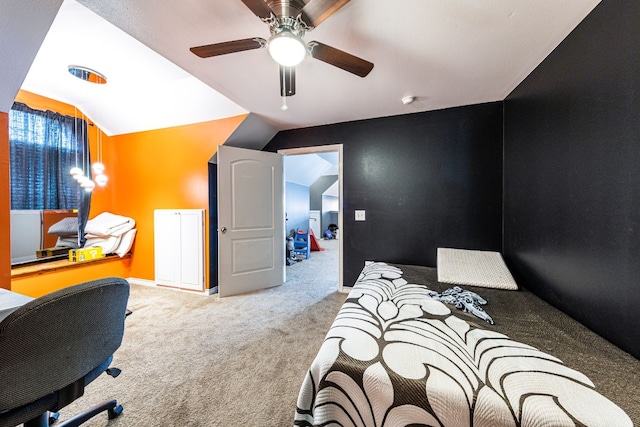 carpeted bedroom featuring ceiling fan and lofted ceiling