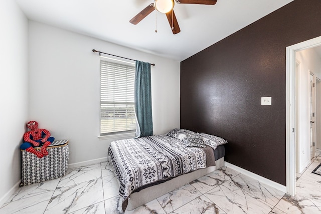 bedroom featuring ceiling fan