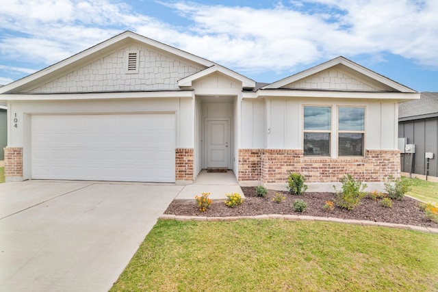 view of front of home with an attached garage, brick siding, concrete driveway, board and batten siding, and a front yard