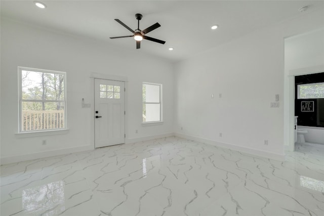 entryway featuring ceiling fan and plenty of natural light