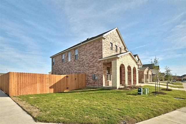 view of property exterior featuring a yard