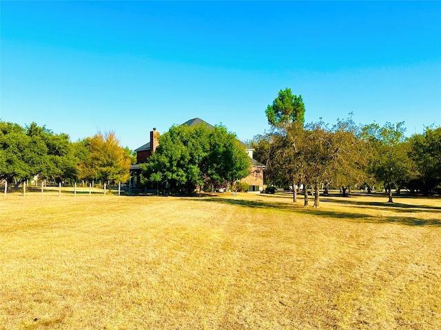 view of community with a lawn