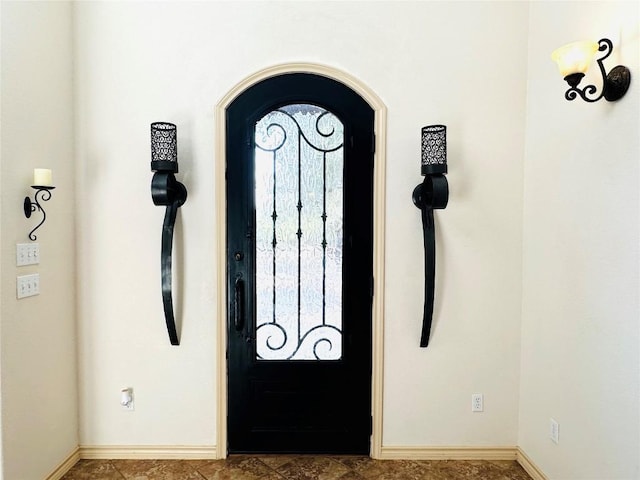 300 Copper Ln, Leander, TX 78641 - foyer featuring baseboards and arched walkways