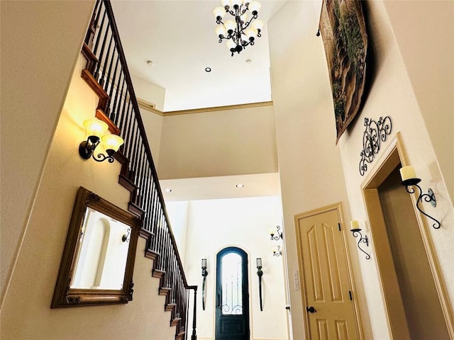 300 Copper Ln, Leander, TX 78641 - entryway with a towering ceiling, stairway, and a chandelier