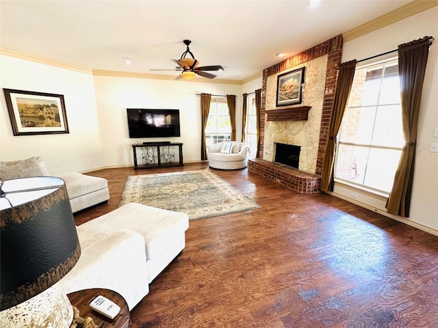 living room with a fireplace, hardwood / wood-style floors, plenty of natural light, and ceiling fan