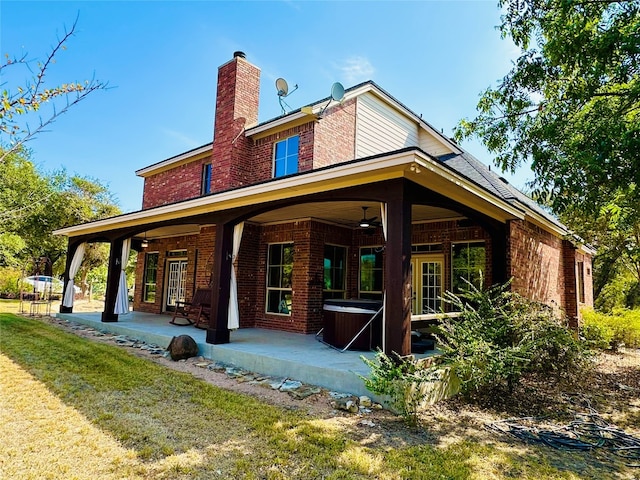 rear view of house featuring a lawn, a patio, and ceiling fan