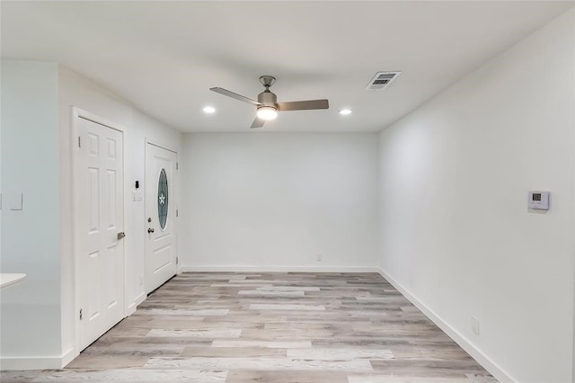 entryway with light hardwood / wood-style floors and ceiling fan