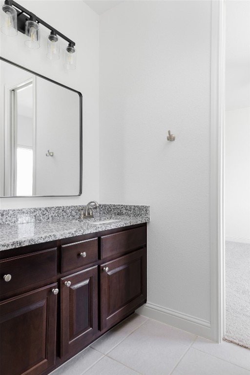 bathroom featuring vanity and tile patterned flooring