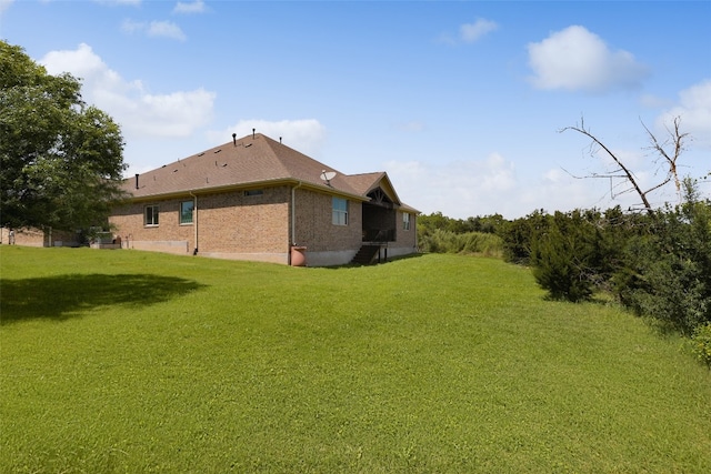 view of home's exterior featuring a lawn