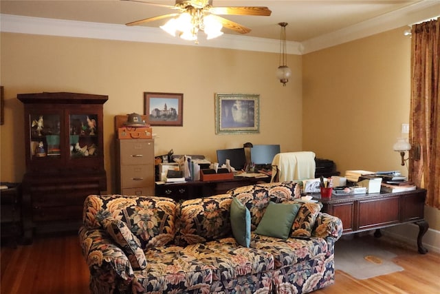 office area featuring crown molding, wood-type flooring, and ceiling fan