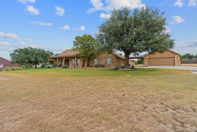 single story home featuring a front yard and a garage