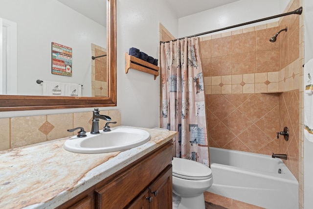 full bathroom with vanity, shower / tub combo with curtain, toilet, and tasteful backsplash