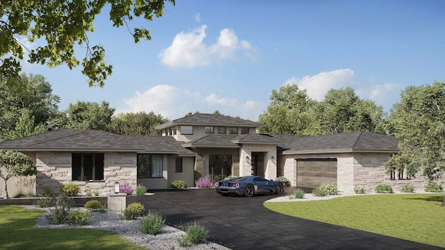 view of front facade featuring a front lawn and a garage