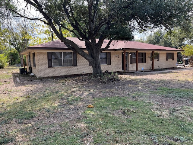 single story home with central AC unit