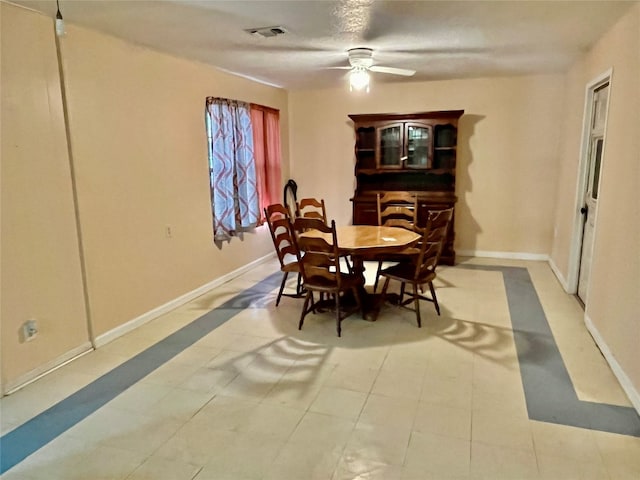 dining room with ceiling fan