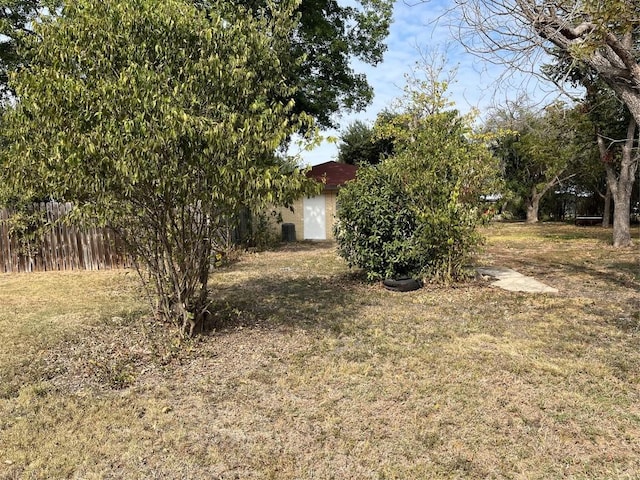 1133 W Bell St, Bartlett, TX 76511 - view of yard featuring fence and central AC unit