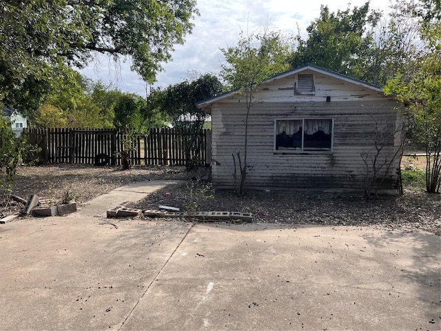 1133 W Bell St, Bartlett, TX 76511 - view of property exterior featuring a patio area and fence