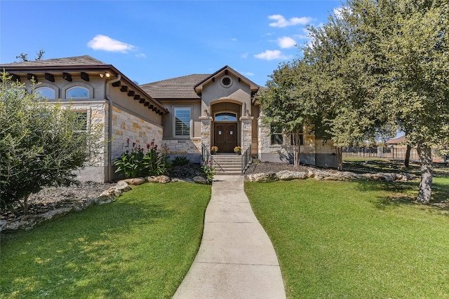 view of front of home with a front lawn