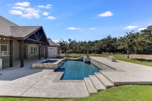 view of swimming pool featuring a patio, pool water feature, an in ground hot tub, and ceiling fan