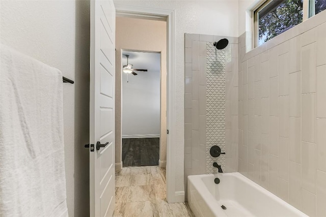 bathroom featuring tiled shower / bath combo