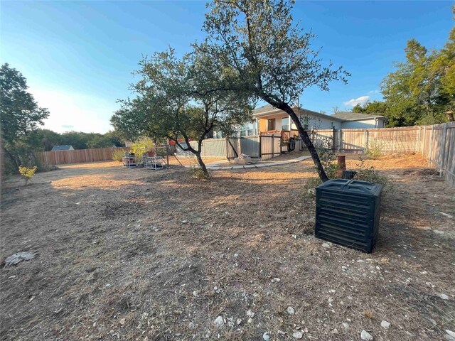 view of yard with central AC unit