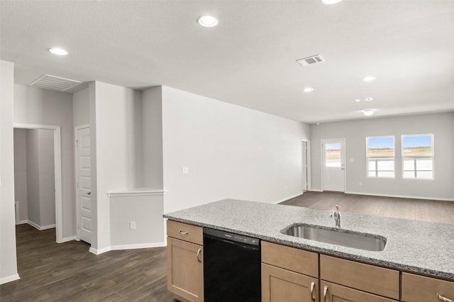204 Lavender Ln, Elgin, TX 78621 - kitchen with dishwasher, dark wood-type flooring, light stone counters, recessed lighting, and open floor plan