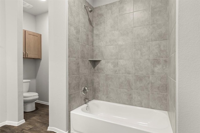 204 Lavender Ln, Elgin, TX 78621 - full bathroom featuring wood finished floors and shower / washtub combination