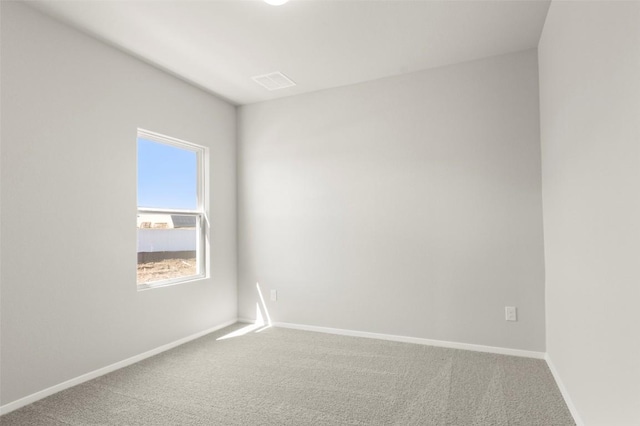 204 Lavender Ln, Elgin, TX 78621 - spare room featuring carpet floors and baseboards