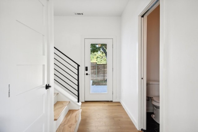 entryway with light hardwood / wood-style flooring