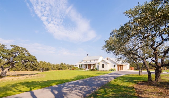 view of front of home featuring a front lawn