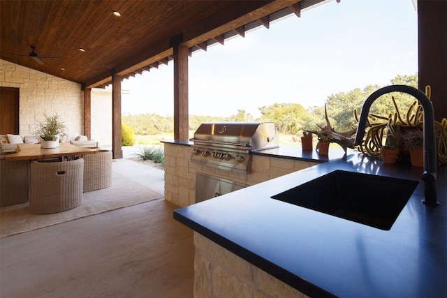 view of patio featuring grilling area and an outdoor kitchen