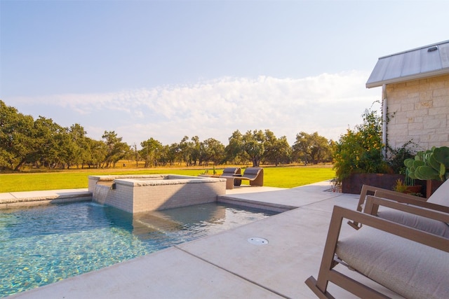 view of swimming pool featuring a yard, a patio, and pool water feature