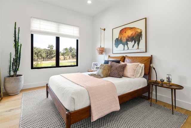 bedroom featuring light hardwood / wood-style floors