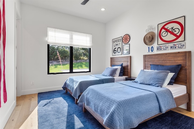 bedroom featuring hardwood / wood-style flooring and ceiling fan